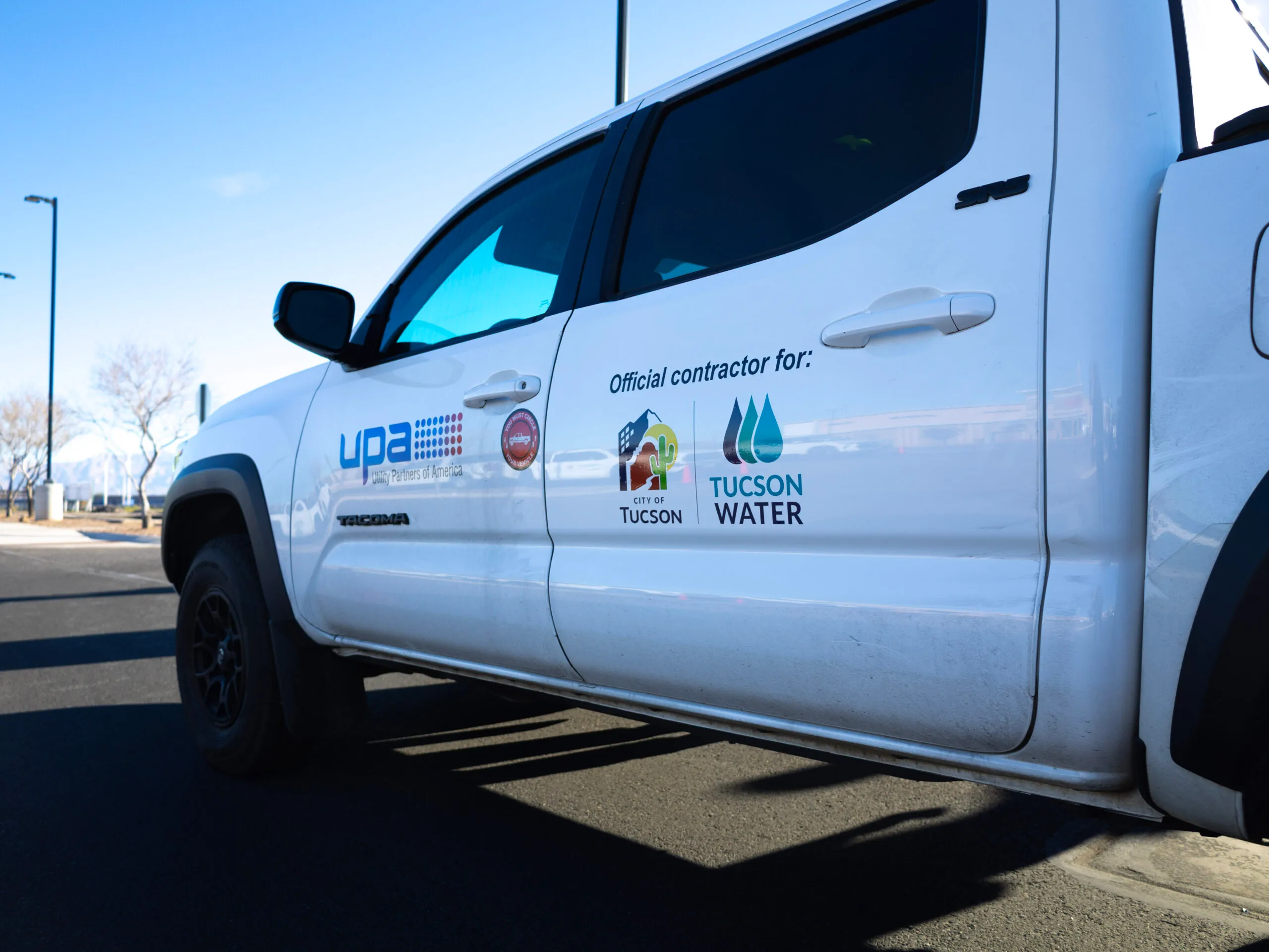 UPA service truck displaying City of Tucson and Tucson Water contractor markings